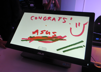 Asus All In One Touch Windows 8 PC can be tilted flat horizontal to make it into a huge tablet