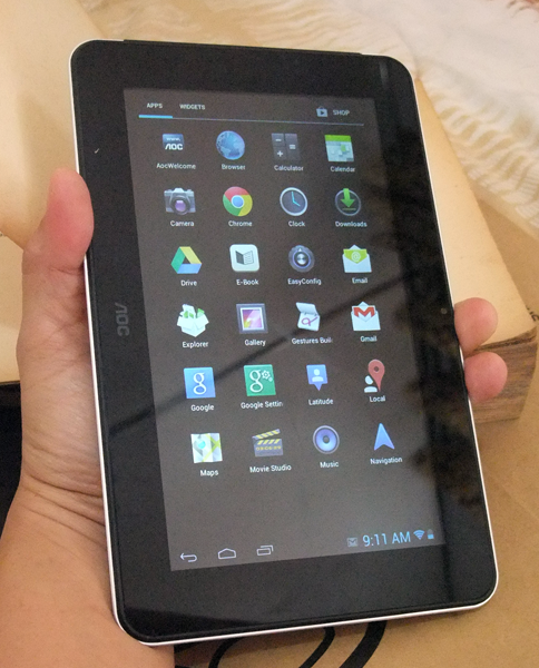 AOC-tablet-held-in-hand